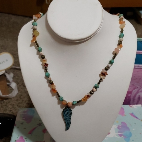 hand made Jewelry - Hand made necklace with antique style wing.